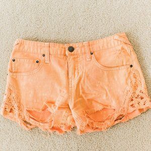 Free People Orange Cutoff Shorts